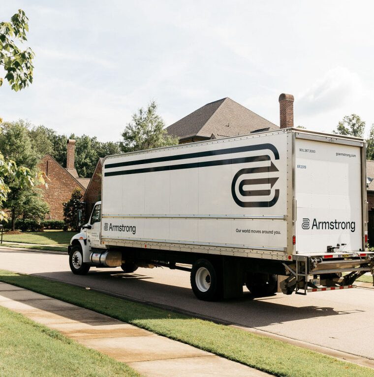 Moving white truck of Armstrong Colorado