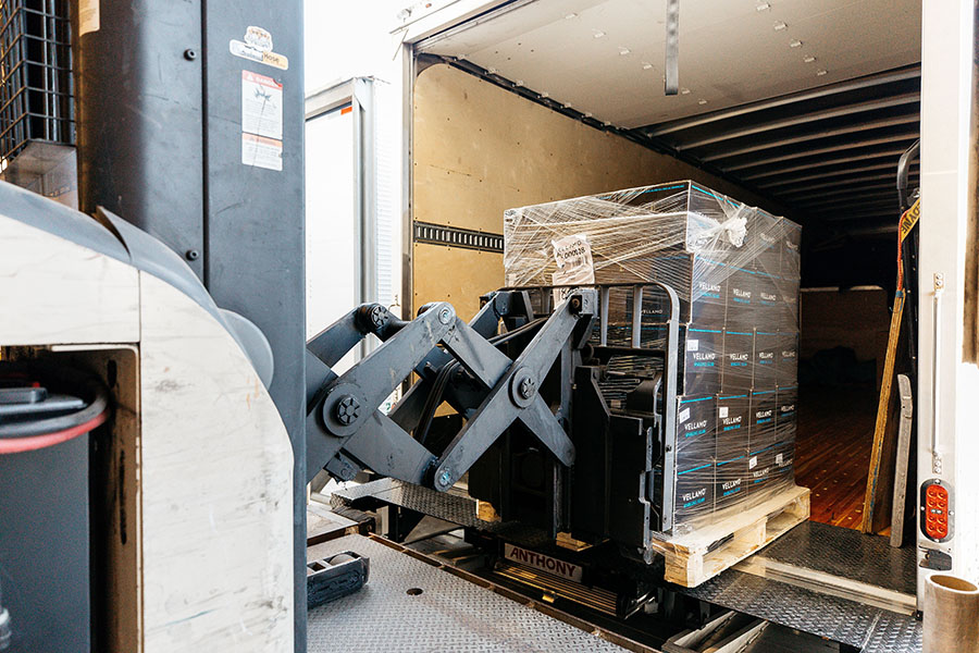 Loading pallet of boxes in the truck