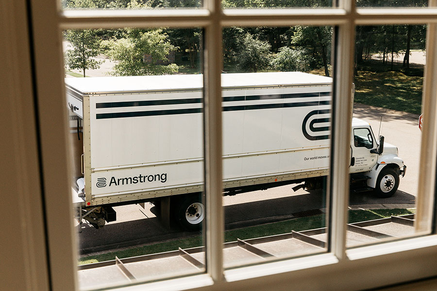 Armstrong truck passes by the window