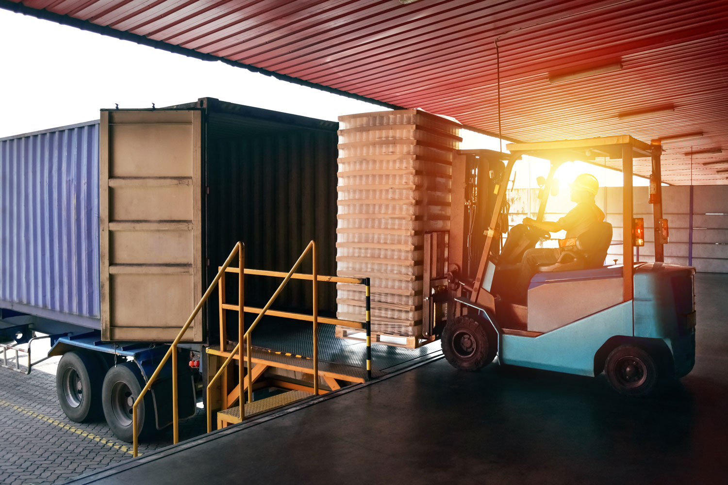 forklift unloading semi truck