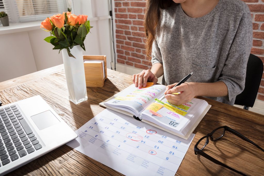 woman with a calendar organizer
