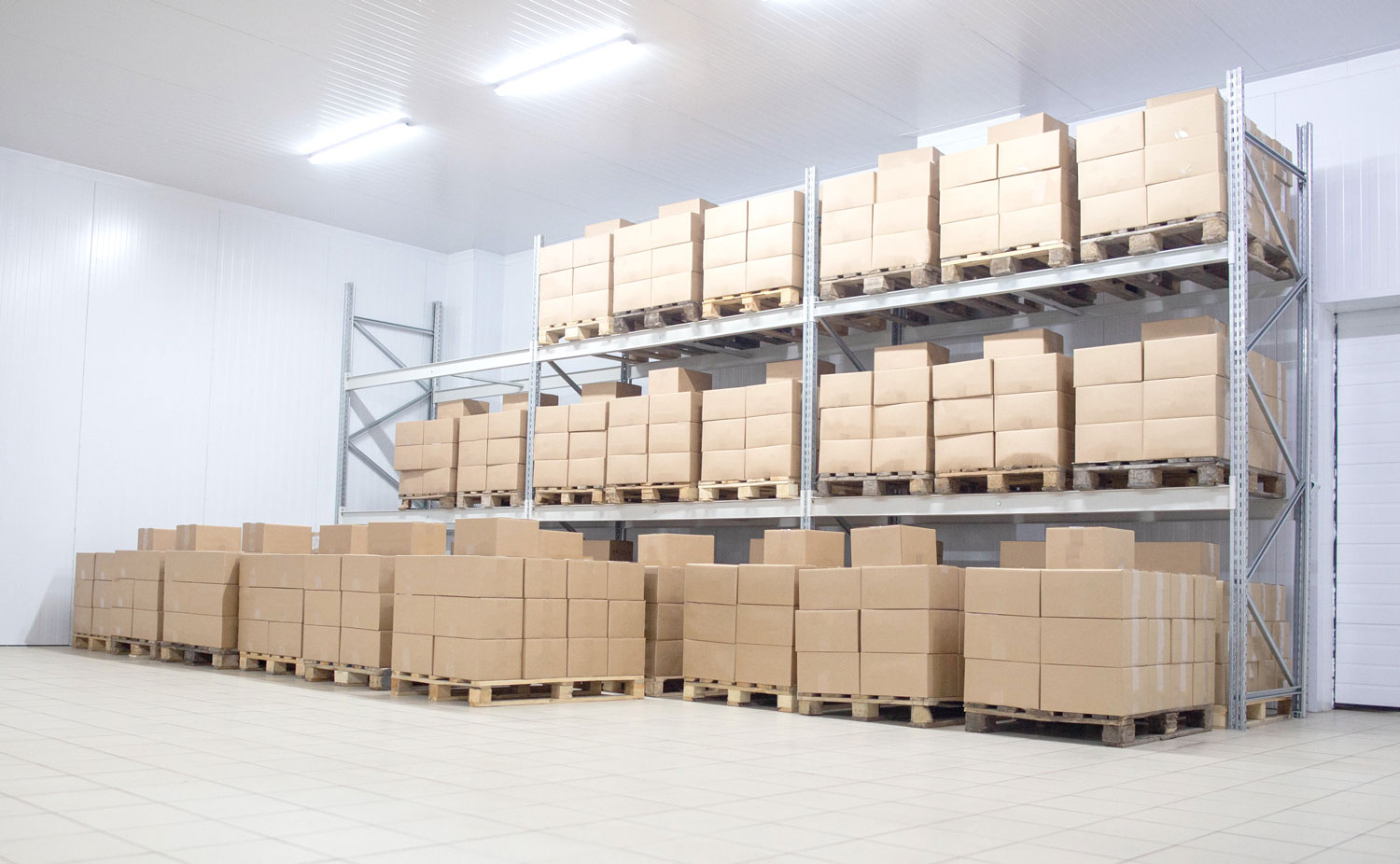 Boxes stacked on top of eachother in a warehouse