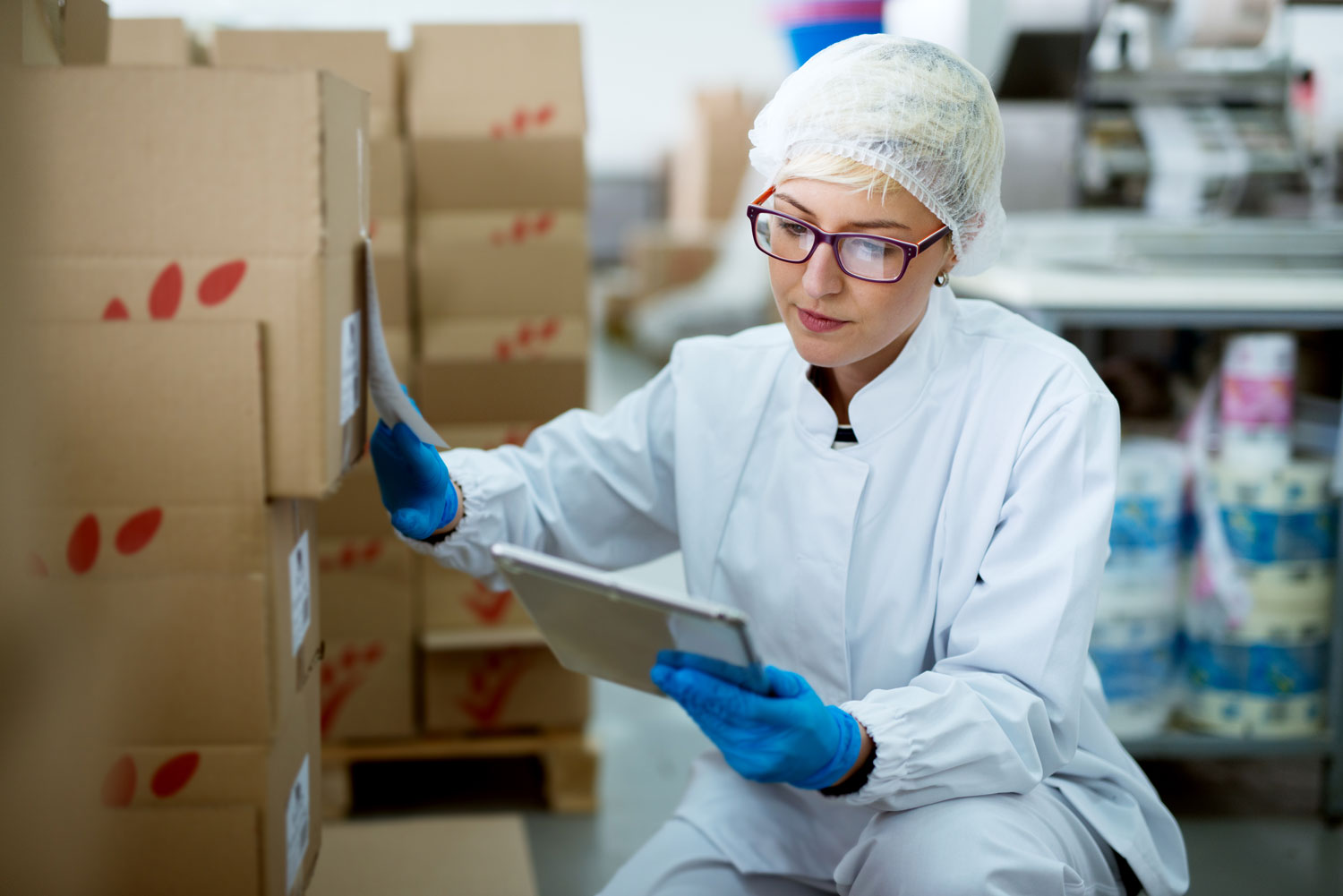 woman at healthcare facility checking boxes