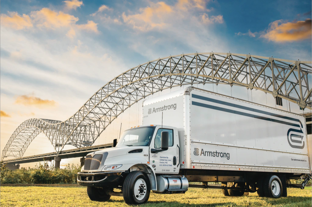 Armstrong white truck with Memphis, TN bridge